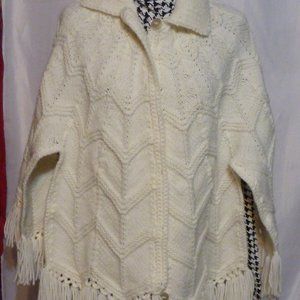 Hand knitted button -up poncho w/ fringes